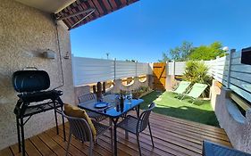 Rez de jardin climatisé, cosy, avec parking à Sanary - Les Amirantes